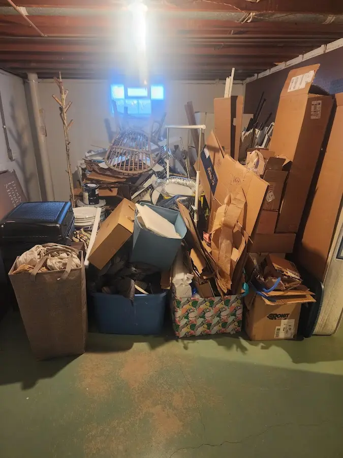 Roll-off dumpster container at job site for 20 Yard Dumpster Rental in Unadilla